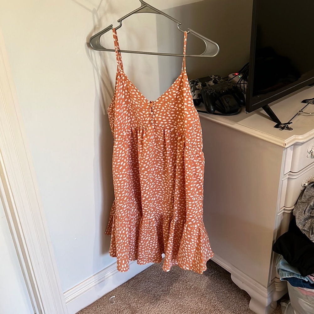 orange and white polka dot dress